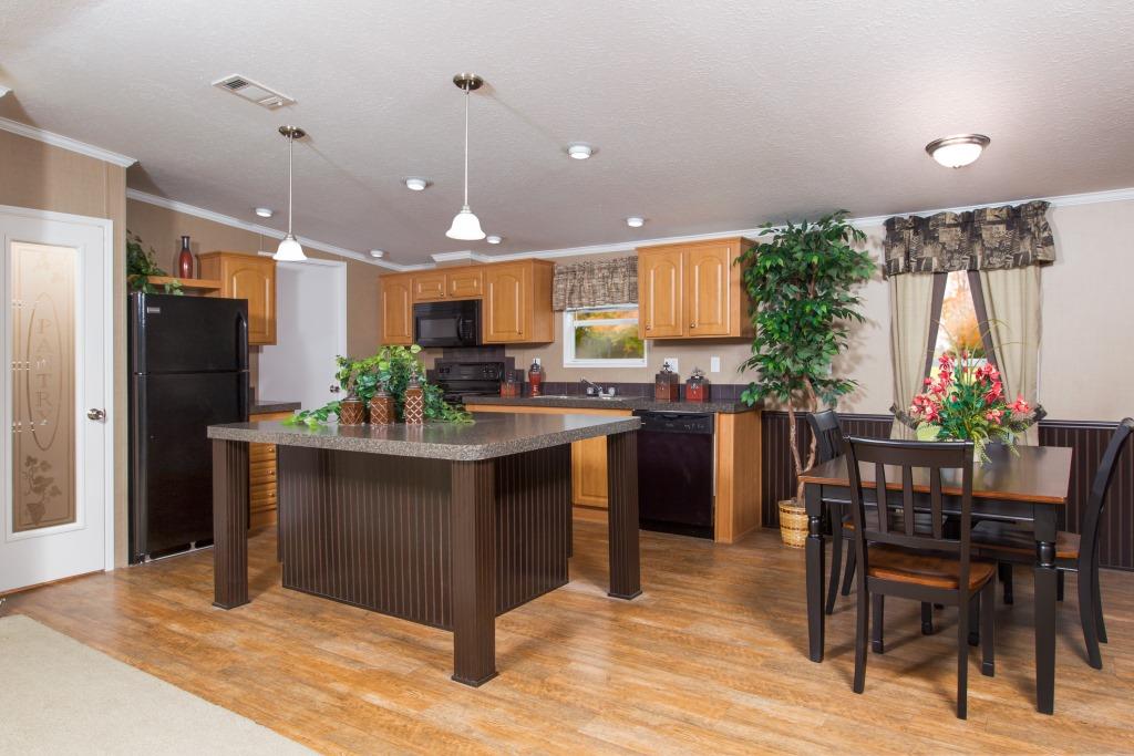 The Peyton model open kitchen featuring a large central island